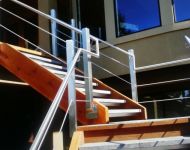 custom railing with glass and cable